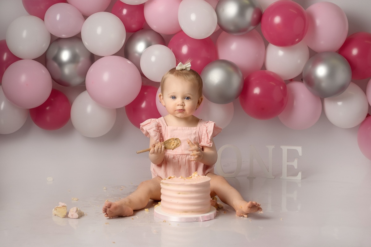 Pink ballon cake smash photoshoot Peterborough